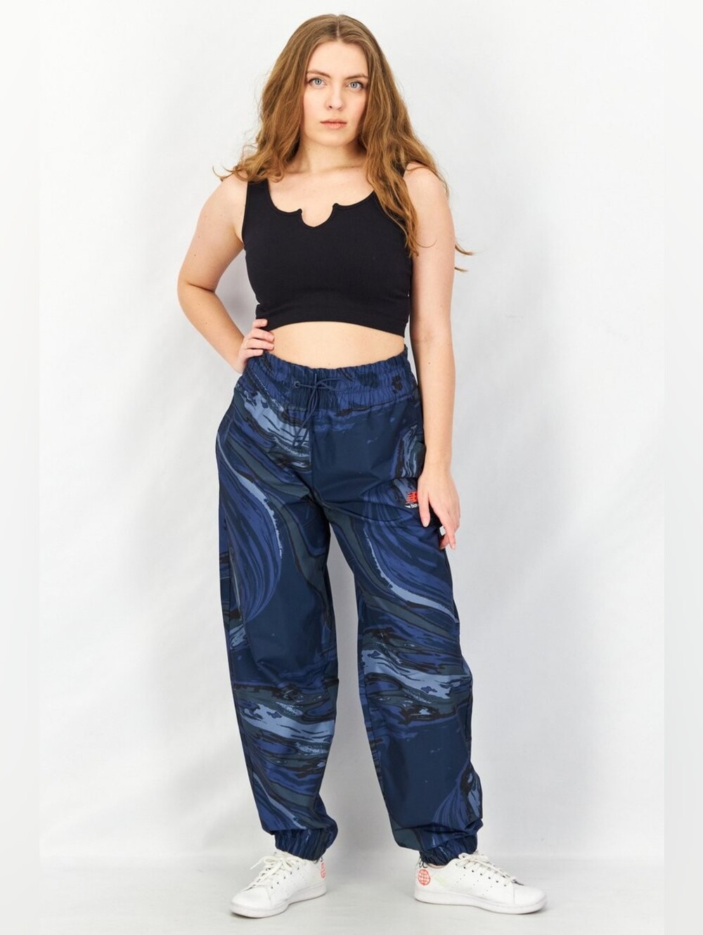 New Balance Essential New Wave Joggers With A Blue Marble Swirl Pattern